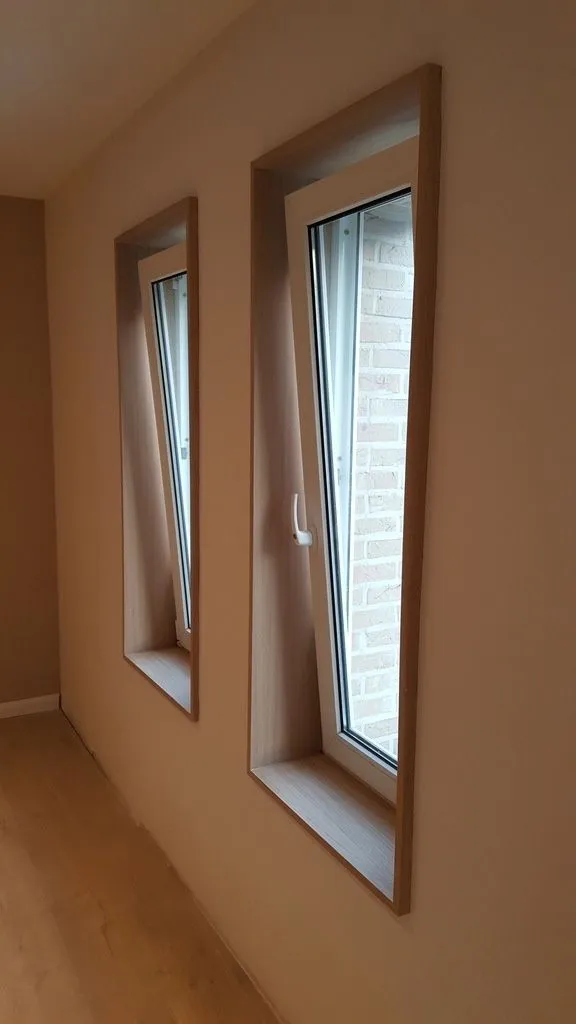 Porte-fenêtre oscillo-battante position ouverte aération sécurisée